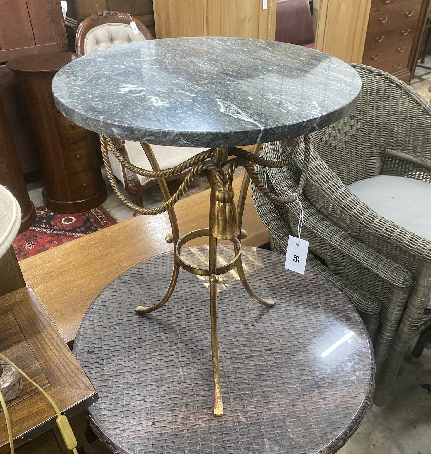 A circular gilt metal marble topped occasional table, diameter 43cm, height 59cm